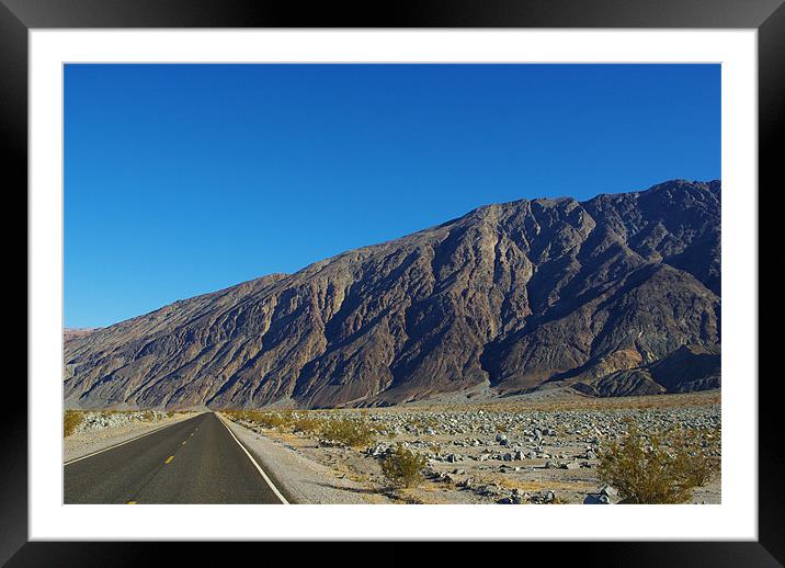 Highway and mountains, Death Valley Framed Mounted Print by Claudio Del Luongo