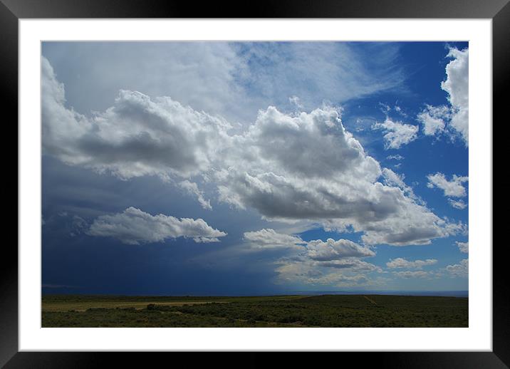 Mixed skies in Montana Framed Mounted Print by Claudio Del Luongo