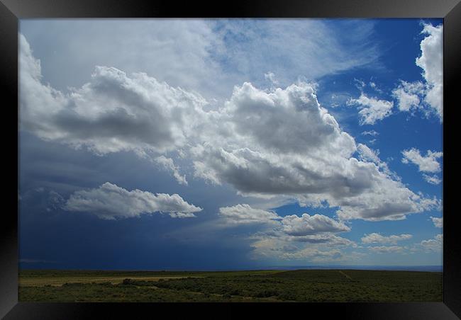 Mixed skies in Montana Framed Print by Claudio Del Luongo