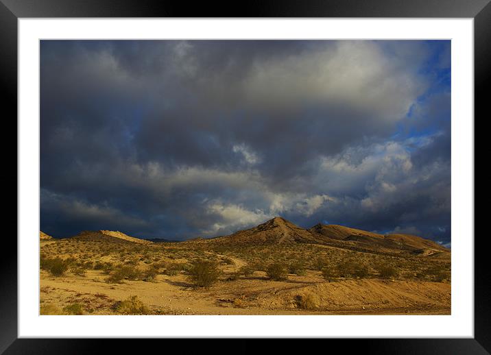 Nevada desert under mixed skies Framed Mounted Print by Claudio Del Luongo