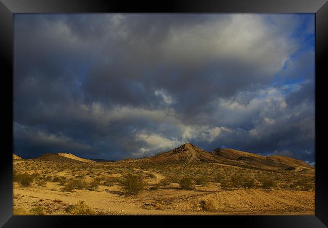 Nevada desert under mixed skies Framed Print by Claudio Del Luongo