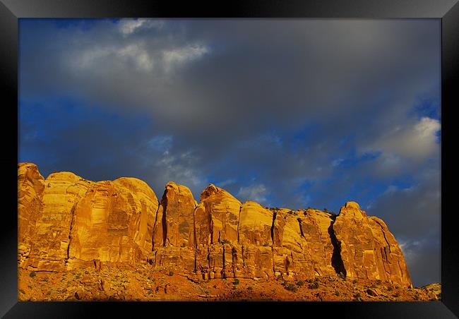 Rock wall in the evening sun Framed Print by Claudio Del Luongo