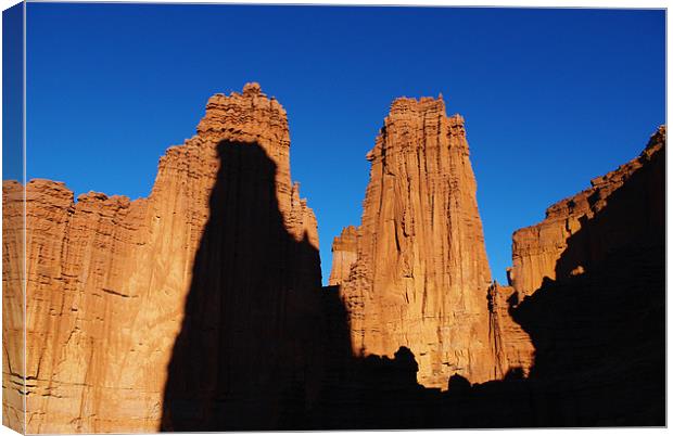 Fisher Towers with climbers Canvas Print by Claudio Del Luongo
