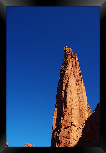 Fisher Tower high into the sky, Utah Framed Print by Claudio Del Luongo
