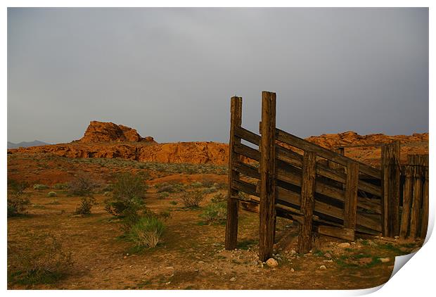 Old corral and red rocks Print by Claudio Del Luongo