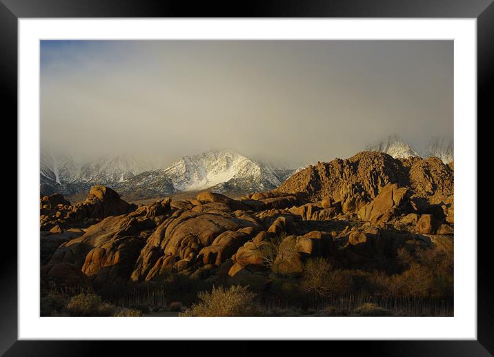 Sun and fog on rocks and Sierra Framed Mounted Print by Claudio Del Luongo