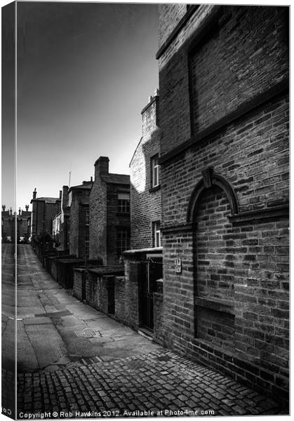 On the Cobbles Canvas Print by Rob Hawkins
