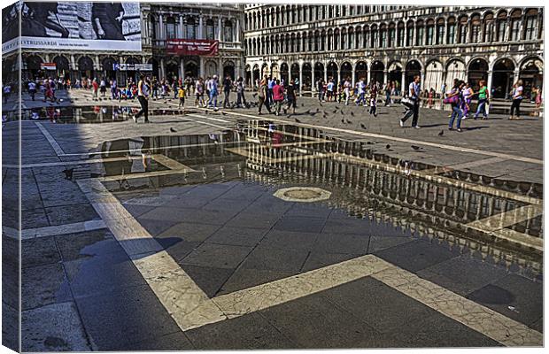 Reflections in Piazza San Marco Canvas Print by Tom Gomez