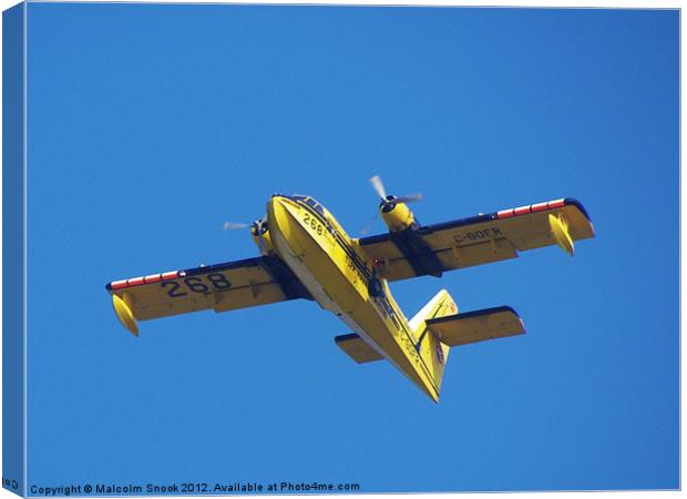 Yellow Seaplane Canvas Print by Malcolm Snook