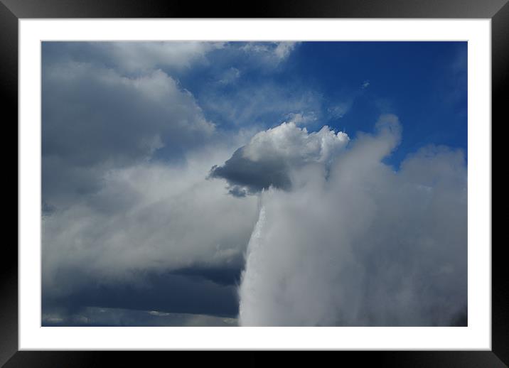Old Faithful merging with clouds, Yellowstone Framed Mounted Print by Claudio Del Luongo