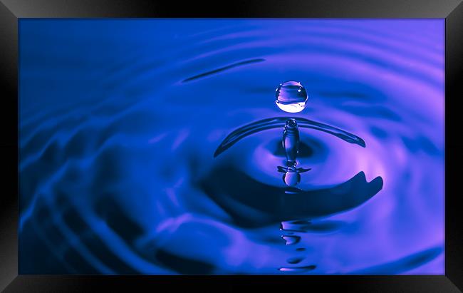 Water Drop Blue Framed Print by Ian Cocklin