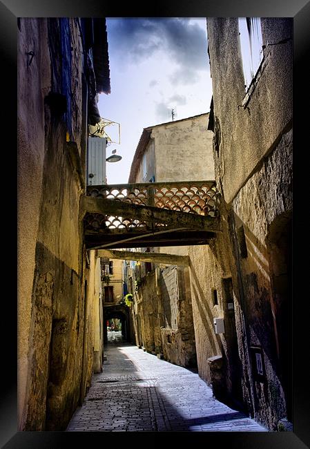 Grungy Alley in Sommieres Framed Print by Jacqi Elmslie