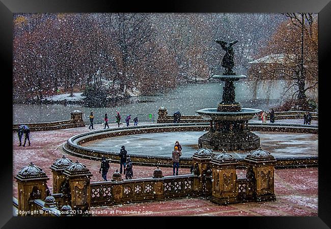 Snow falls on Bethesda Terrace Framed Print by Chris Lord
