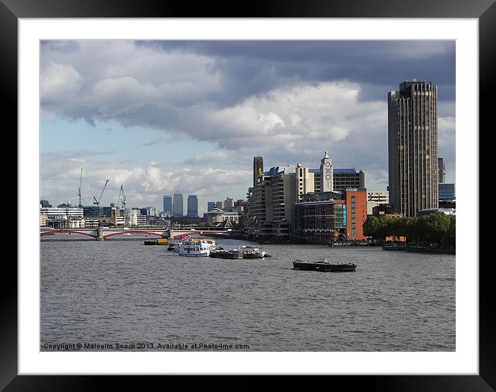 Oxo building to Canary Wharf Framed Mounted Print by Malcolm Snook