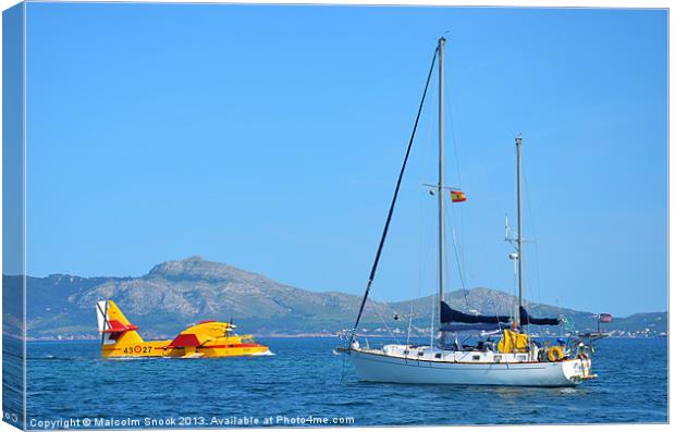 Seaplane and yacht Canvas Print by Malcolm Snook