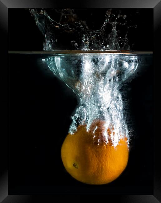 Orange Splash Framed Print by Ian Cocklin