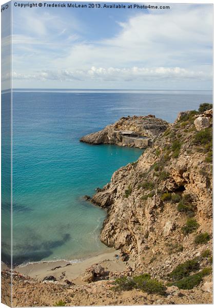 Rugged coastline on Ibiza Canvas Print by Frederick McLean