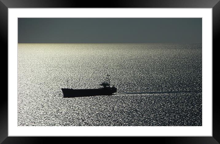 Black Cargo Boat On Silver Sea Framed Mounted Print by Dave Bell