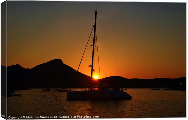 Catamaran sunset in Ibiza Canvas Print by Malcolm Snook