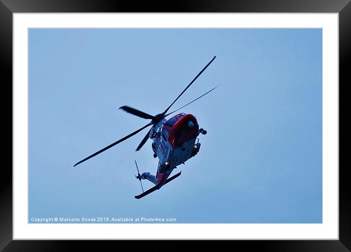 Red and white coastguard helicopter Framed Mounted Print by Malcolm Snook