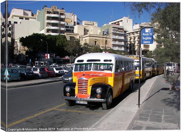 Classic bus streets of Malta Canvas Print by Malcolm Snook