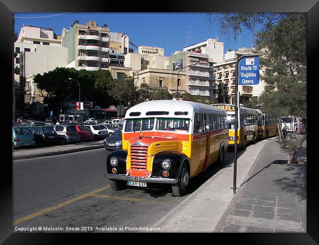 Classic bus streets of Malta Framed Print by Malcolm Snook