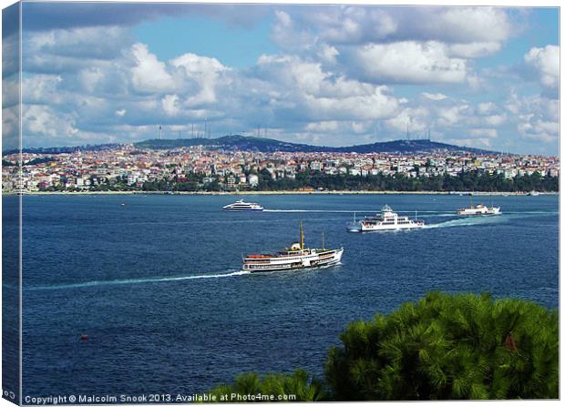 Ferries cross the Bosphorus Canvas Print by Malcolm Snook
