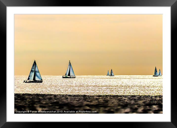 Sailboats and the Golden Sky Framed Mounted Print by Panas Wiwatpanachat