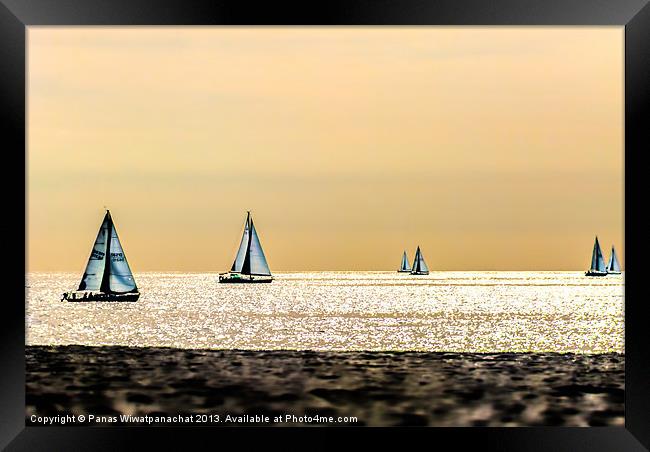 Sailboats and the Golden Sky Framed Print by Panas Wiwatpanachat