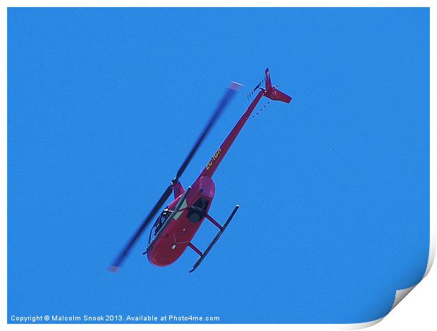 Red R44 helicopter from below Print by Malcolm Snook