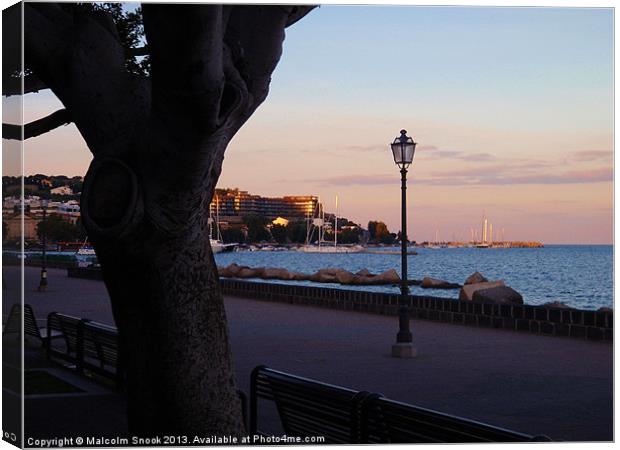 Milazzo in Sicily at dusk Canvas Print by Malcolm Snook