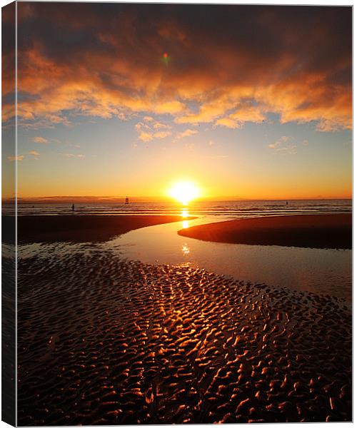 Sand Ripples reflected in a glorious sunset. Canvas Print by mike fahy