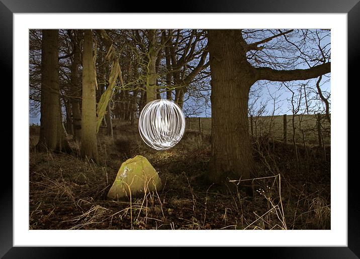 Light ball and stone Framed Mounted Print by Gavin Wilson