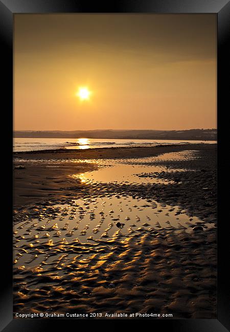 Sunset on the beach Framed Print by Graham Custance