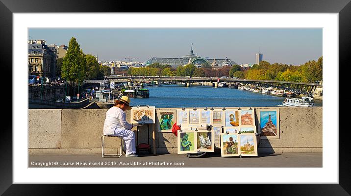 An artist displays her work on a bridge over the S Framed Mounted Print by Louise Heusinkveld