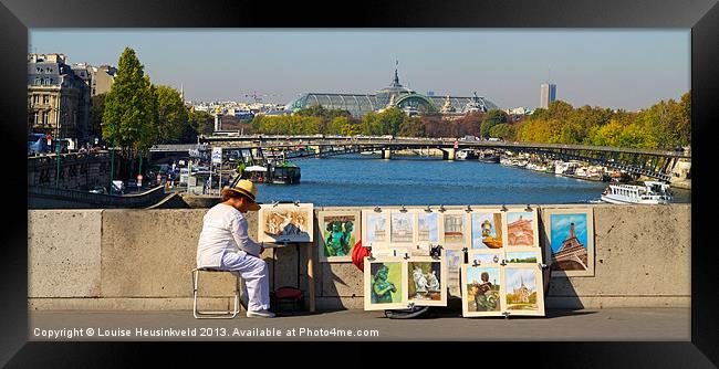 An artist displays her work on a bridge over the S Framed Print by Louise Heusinkveld