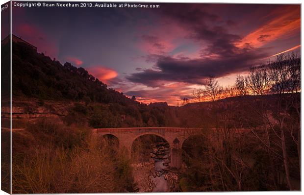 Bridge at Sunset Canvas Print by Sean Needham