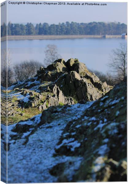 Rocks over Cropston Reservoir Canvas Print by Christopher Chapman