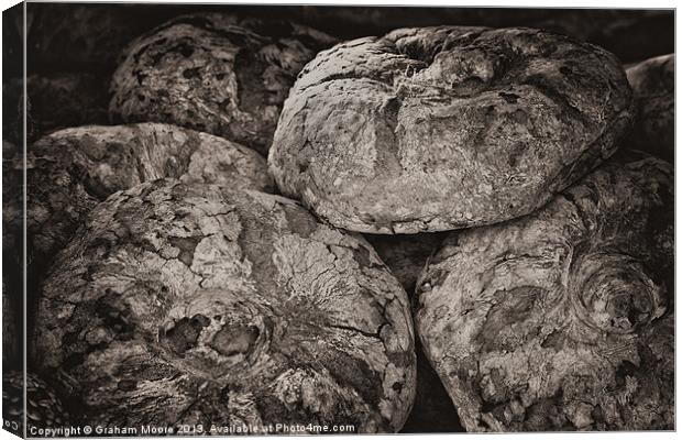 Rustic bread loaves Canvas Print by Graham Moore