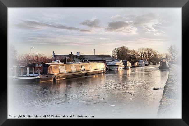 Sunset on The Frozen Lancaster Canal. Framed Print by Lilian Marshall