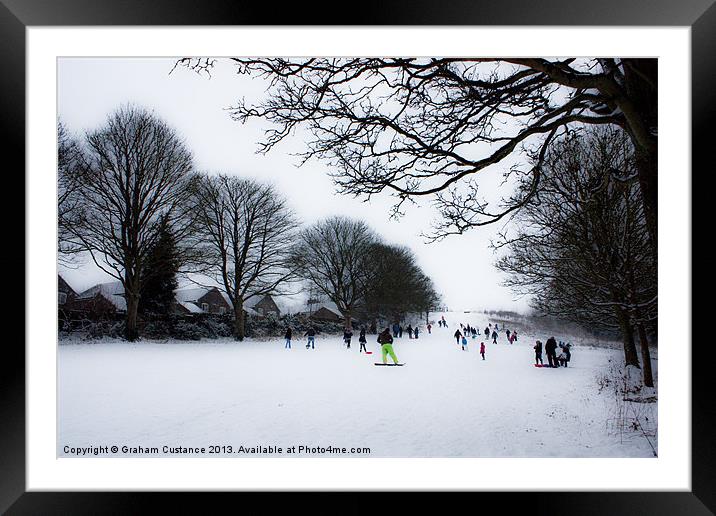 Sledging at the Downs Framed Mounted Print by Graham Custance