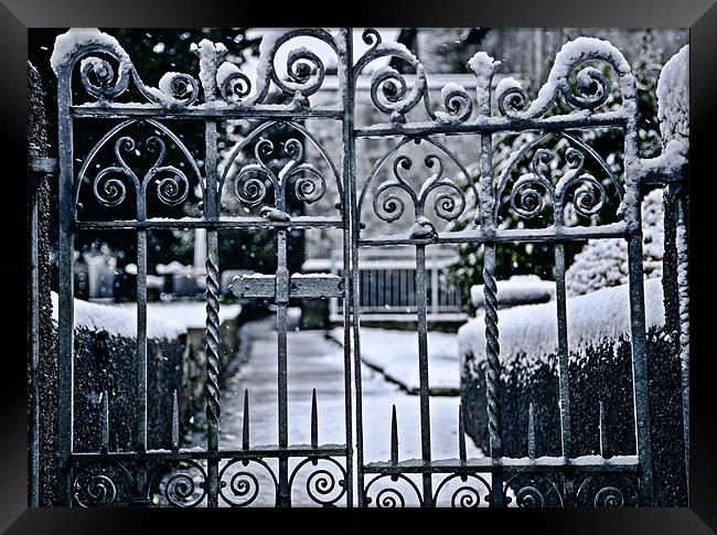 Snowy Church Gate Framed Print by Simon West