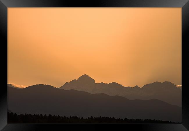 Sunset behind the Julian Alps Framed Print by Ian Middleton