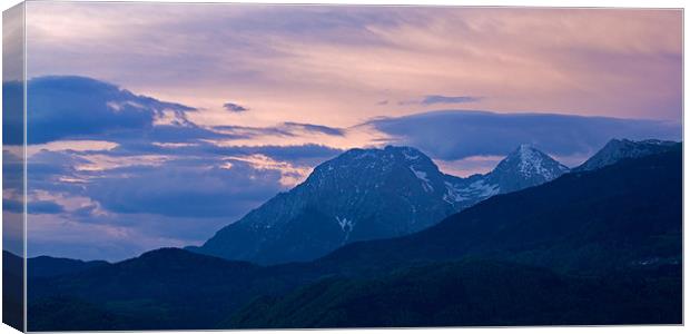 Kamnik Alps at sunset Canvas Print by Ian Middleton