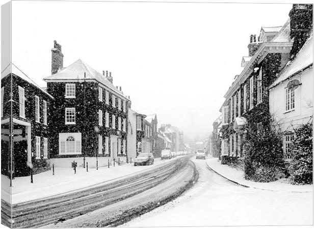 Snowy street scene Canvas Print by Oxon Images
