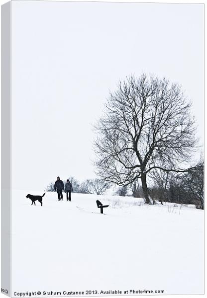A walk in the snow Canvas Print by Graham Custance
