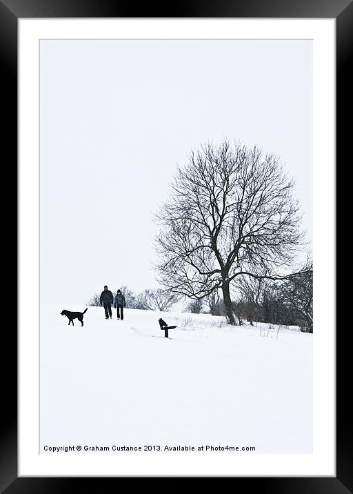 A walk in the snow Framed Mounted Print by Graham Custance