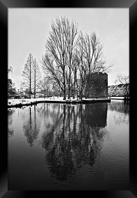 Cow Tower in the Snow Framed Print by Paul Macro