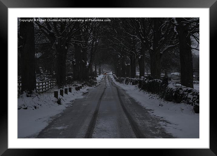 brake lights on the snowy hill Framed Mounted Print by Robert Chadwick