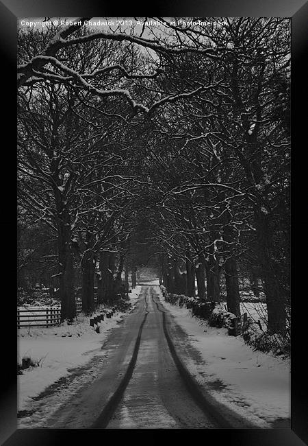 tracks in the snow Framed Print by Robert Chadwick